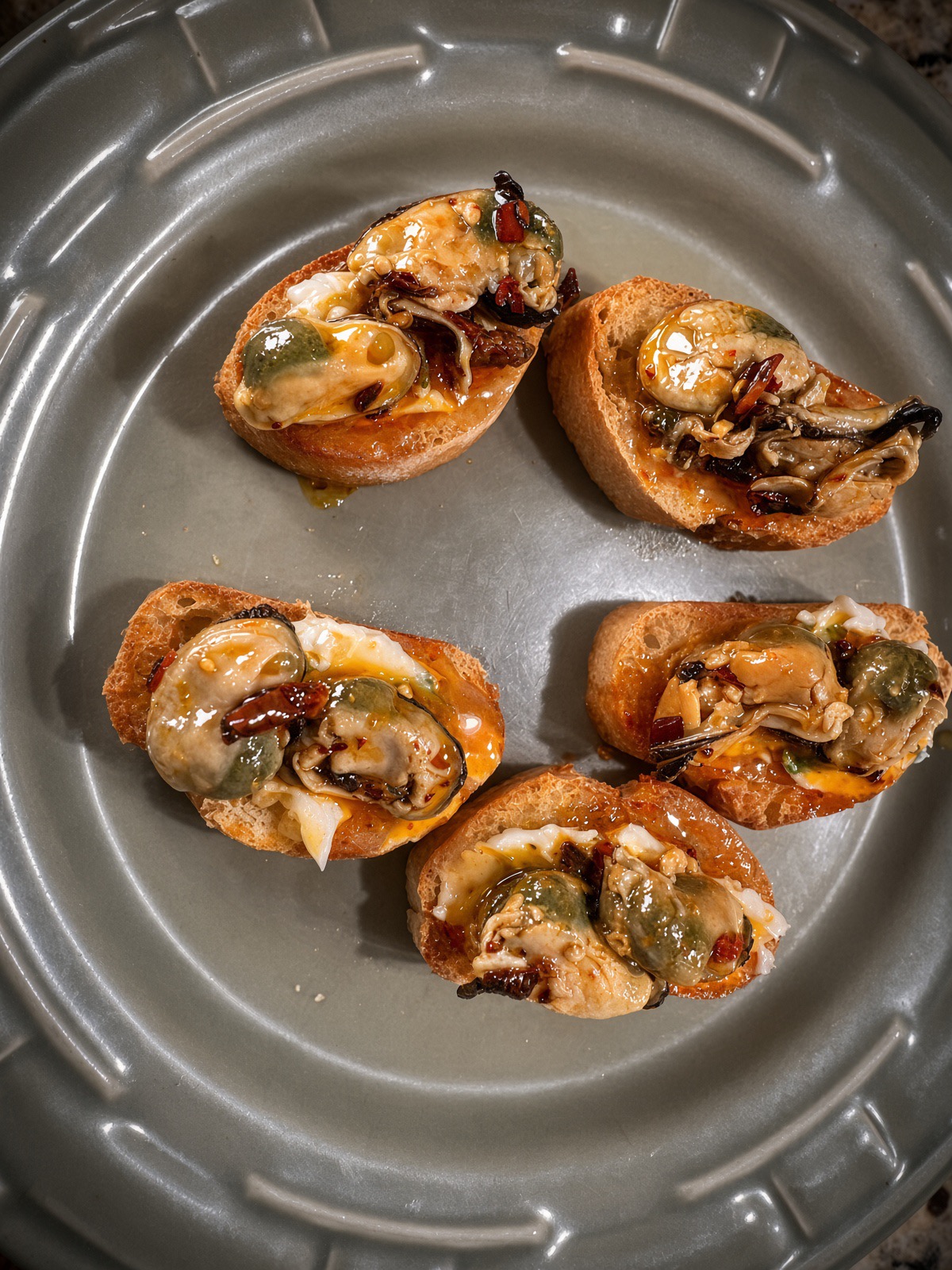 Smoked Mussels Crostini with Garlic Butter & Chili Crisp