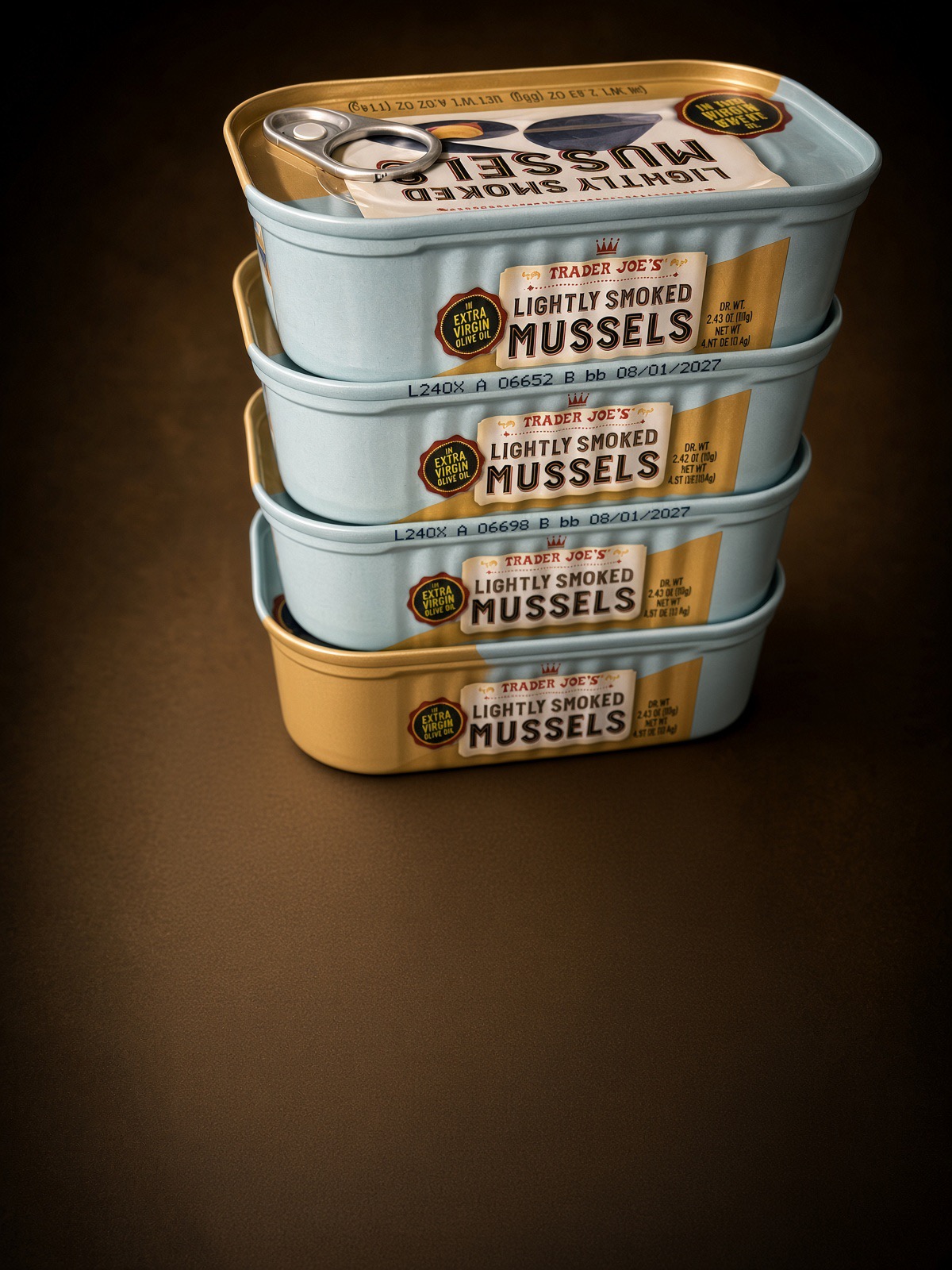Stack of Trader Joe’s Lightly Smoked Mussels tins