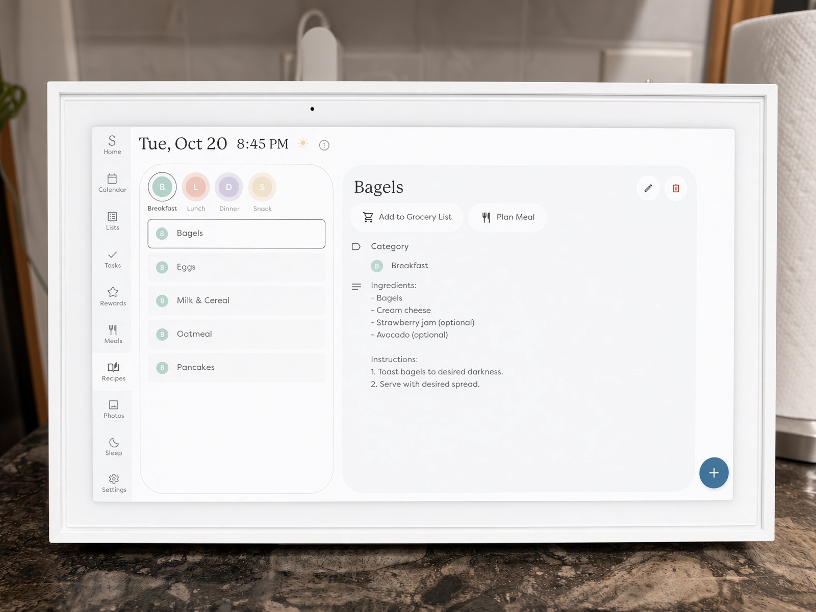 Skylight Calendar screen showing a saved bagels breakfast recipe with ingredients, instructions and an Add to Grocery List button