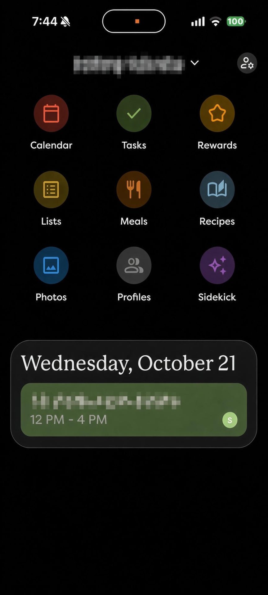 Skylight mobile app home screen with buttons for Calendar, Tasks, Rewards, Lists, Meals, Recipes, Photos, Profiles and Sidekick, and today’s event blurred