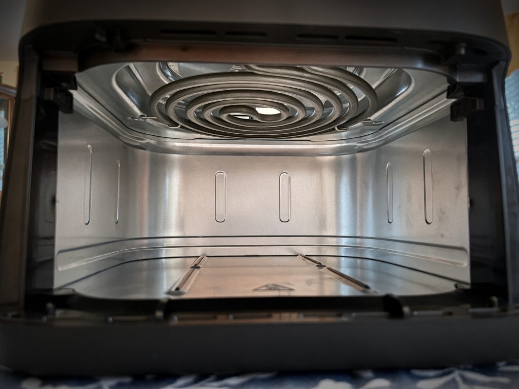 Inside the Ninja Air Fryer Pro with the basket removed, showing the heating element