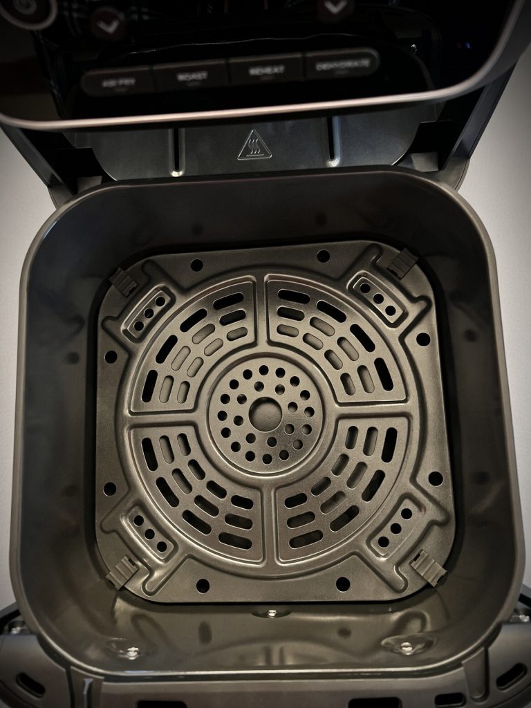 Ninja Air Fryer Pro basket pulled out showing the crisper plate