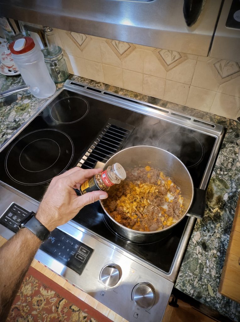 Italian seasoning sprinkled over the sausage and vegetables